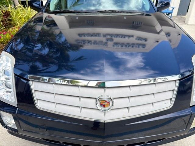 2008 Blue Chip /Cashmere/Cocoa Cadillac SRX SUNROOF LOW MILES 52,938 (1GYEE637380) with an 3.6L VVT V6 SFI Engine engine, Automatic transmission, located at 4701 North Dixie Hwy, Pompano Beach, FL, 33064, (954) 422-2889, 26.240938, -80.123474 - OUR WEBPAGE FLORIDACARS1.COM HAS OVER 100 PHOTOS AND FREE CARFAX LINK 2008 Cadillac SRX V6 4 Door Wagon/Sport Utility 3.6L V6 F Gasoline 24 MPG Rear Wheel Drive Features ABS Brakes Air Conditioning Alloy Wheels AM/FM Stereo Automatic Transmission Auxiliary Audio Input BOSE Sound System CD Audio Crui- Photo#26