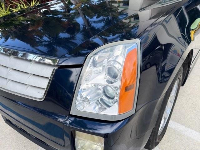 2008 Blue Chip /Cashmere/Cocoa Cadillac SRX SUNROOF LOW MILES 52,938 (1GYEE637380) with an 3.6L VVT V6 SFI Engine engine, Automatic transmission, located at 4701 North Dixie Hwy, Pompano Beach, FL, 33064, (954) 422-2889, 26.240938, -80.123474 - OUR WEBPAGE FLORIDACARS1.COM HAS OVER 100 PHOTOS AND FREE CARFAX LINK 2008 Cadillac SRX V6 4 Door Wagon/Sport Utility 3.6L V6 F Gasoline 24 MPG Rear Wheel Drive Features ABS Brakes Air Conditioning Alloy Wheels AM/FM Stereo Automatic Transmission Auxiliary Audio Input BOSE Sound System CD Audio Crui- Photo#28