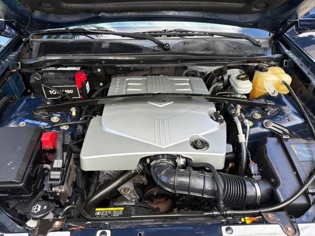 2008 Blue Chip /Cashmere/Cocoa Cadillac SRX SUNROOF LOW MILES 52,938 (1GYEE637380) with an 3.6L VVT V6 SFI Engine engine, Automatic transmission, located at 4701 North Dixie Hwy, Pompano Beach, FL, 33064, (954) 422-2889, 26.240938, -80.123474 - OUR WEBPAGE FLORIDACARS1.COM HAS OVER 100 PHOTOS AND FREE CARFAX LINK 2008 Cadillac SRX V6 4 Door Wagon/Sport Utility 3.6L V6 F Gasoline 24 MPG Rear Wheel Drive Features ABS Brakes Air Conditioning Alloy Wheels AM/FM Stereo Automatic Transmission Auxiliary Audio Input BOSE Sound System CD Audio Crui- Photo#52