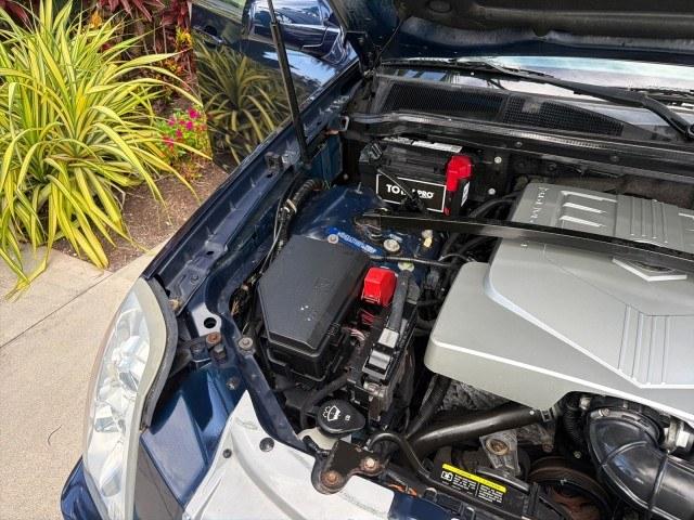 2008 Blue Chip /Cashmere/Cocoa Cadillac SRX SUNROOF LOW MILES 52,938 (1GYEE637380) with an 3.6L VVT V6 SFI Engine engine, Automatic transmission, located at 4701 North Dixie Hwy, Pompano Beach, FL, 33064, (954) 422-2889, 26.240938, -80.123474 - OUR WEBPAGE FLORIDACARS1.COM HAS OVER 100 PHOTOS AND FREE CARFAX LINK 2008 Cadillac SRX V6 4 Door Wagon/Sport Utility 3.6L V6 F Gasoline 24 MPG Rear Wheel Drive Features ABS Brakes Air Conditioning Alloy Wheels AM/FM Stereo Automatic Transmission Auxiliary Audio Input BOSE Sound System CD Audio Crui- Photo#53