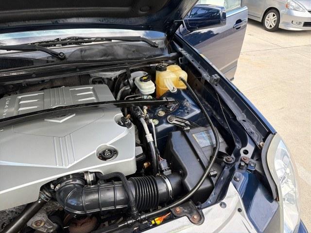 2008 Blue Chip /Cashmere/Cocoa Cadillac SRX SUNROOF LOW MILES 52,938 (1GYEE637380) with an 3.6L VVT V6 SFI Engine engine, Automatic transmission, located at 4701 North Dixie Hwy, Pompano Beach, FL, 33064, (954) 422-2889, 26.240938, -80.123474 - OUR WEBPAGE FLORIDACARS1.COM HAS OVER 100 PHOTOS AND FREE CARFAX LINK 2008 Cadillac SRX V6 4 Door Wagon/Sport Utility 3.6L V6 F Gasoline 24 MPG Rear Wheel Drive Features ABS Brakes Air Conditioning Alloy Wheels AM/FM Stereo Automatic Transmission Auxiliary Audio Input BOSE Sound System CD Audio Crui- Photo#54