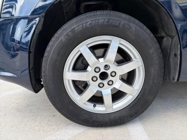 2008 Blue Chip /Cashmere/Cocoa Cadillac SRX SUNROOF LOW MILES 52,938 (1GYEE637380) with an 3.6L VVT V6 SFI Engine engine, Automatic transmission, located at 4701 North Dixie Hwy, Pompano Beach, FL, 33064, (954) 422-2889, 26.240938, -80.123474 - OUR WEBPAGE FLORIDACARS1.COM HAS OVER 100 PHOTOS AND FREE CARFAX LINK 2008 Cadillac SRX V6 4 Door Wagon/Sport Utility 3.6L V6 F Gasoline 24 MPG Rear Wheel Drive Features ABS Brakes Air Conditioning Alloy Wheels AM/FM Stereo Automatic Transmission Auxiliary Audio Input BOSE Sound System CD Audio Crui- Photo#58