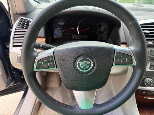 2008 Blue Chip /Cashmere/Cocoa Cadillac SRX SUNROOF LOW MILES 52,938 (1GYEE637380) with an 3.6L VVT V6 SFI Engine engine, Automatic transmission, located at 4701 North Dixie Hwy, Pompano Beach, FL, 33064, (954) 422-2889, 26.240938, -80.123474 - OUR WEBPAGE FLORIDACARS1.COM HAS OVER 100 PHOTOS AND FREE CARFAX LINK 2008 Cadillac SRX V6 4 Door Wagon/Sport Utility 3.6L V6 F Gasoline 24 MPG Rear Wheel Drive Features ABS Brakes Air Conditioning Alloy Wheels AM/FM Stereo Automatic Transmission Auxiliary Audio Input BOSE Sound System CD Audio Crui- Photo#77