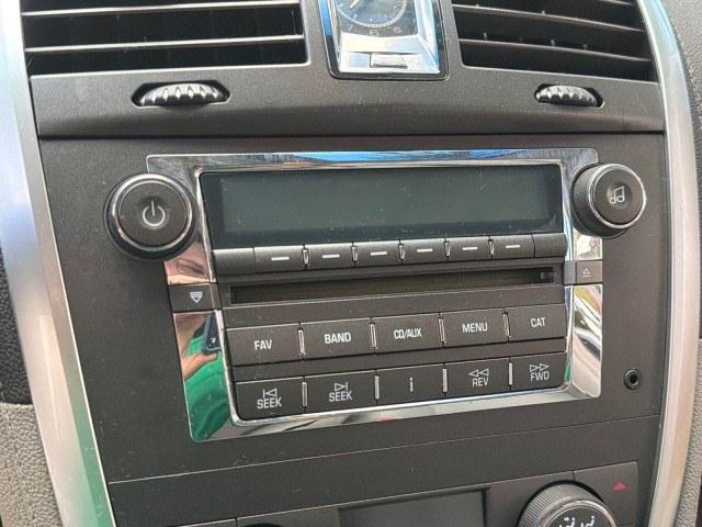 2008 Blue Chip /Cashmere/Cocoa Cadillac SRX SUNROOF LOW MILES 52,938 (1GYEE637380) with an 3.6L VVT V6 SFI Engine engine, Automatic transmission, located at 4701 North Dixie Hwy, Pompano Beach, FL, 33064, (954) 422-2889, 26.240938, -80.123474 - OUR WEBPAGE FLORIDACARS1.COM HAS OVER 100 PHOTOS AND FREE CARFAX LINK 2008 Cadillac SRX V6 4 Door Wagon/Sport Utility 3.6L V6 F Gasoline 24 MPG Rear Wheel Drive Features ABS Brakes Air Conditioning Alloy Wheels AM/FM Stereo Automatic Transmission Auxiliary Audio Input BOSE Sound System CD Audio Crui- Photo#84
