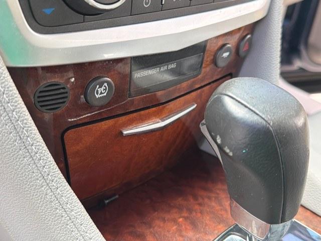2008 Blue Chip /Cashmere/Cocoa Cadillac SRX SUNROOF LOW MILES 52,938 (1GYEE637380) with an 3.6L VVT V6 SFI Engine engine, Automatic transmission, located at 4701 North Dixie Hwy, Pompano Beach, FL, 33064, (954) 422-2889, 26.240938, -80.123474 - OUR WEBPAGE FLORIDACARS1.COM HAS OVER 100 PHOTOS AND FREE CARFAX LINK 2008 Cadillac SRX V6 4 Door Wagon/Sport Utility 3.6L V6 F Gasoline 24 MPG Rear Wheel Drive Features ABS Brakes Air Conditioning Alloy Wheels AM/FM Stereo Automatic Transmission Auxiliary Audio Input BOSE Sound System CD Audio Crui- Photo#87