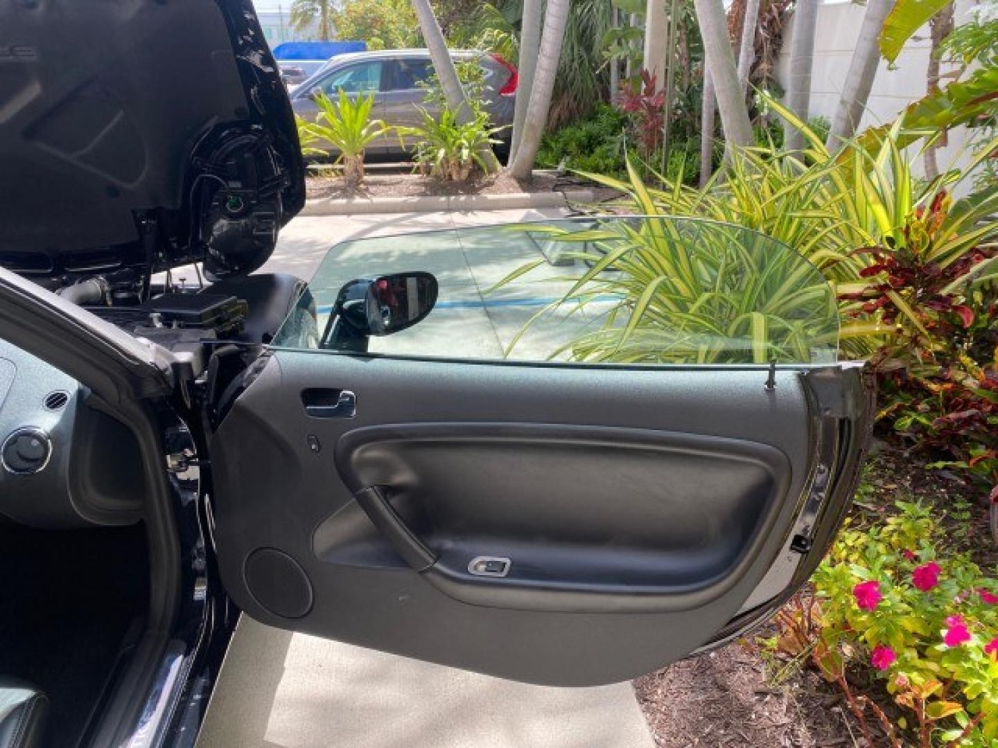 2008 Mysterious (Black) /Ebony Pontiac Solstice GXP 2.0 ECOTURBO LOW MILES 26,059 (1G2MG35X28Y) with an Turbo Ecotec 2.0L VVT DOHC 4-Cyl Aluminum Engine engine, Manual transmission, located at 4701 North Dixie Hwy, Pompano Beach, FL, 33064, (954) 422-2889, 26.240938, -80.123474 - OUR WEBPAGE FLORIDACARS1.COM HAS OVER 100 PHOTOS AND FREE CARFAX LINK 2008 Pontiac Solstice GXP Convertible 2.0L I4 F Gasoline 31 MPG Rear Wheel Drive Features ABS Brakes Air Conditioning Alloy Wheels AM/FM Stereo Auxiliary Audio Input CD Audio Convenience Package Cruise Control Leather Seats Manual- Photo#11