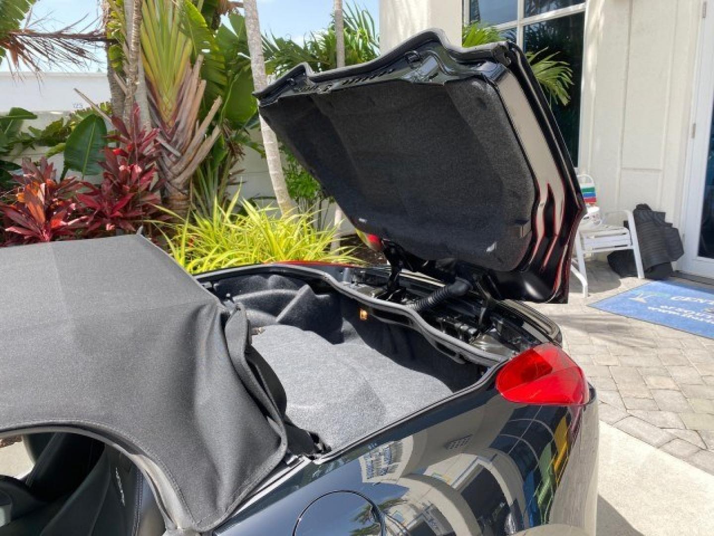2008 Mysterious (Black) /Ebony Pontiac Solstice GXP 2.0 ECOTURBO LOW MILES 26,059 (1G2MG35X28Y) with an Turbo Ecotec 2.0L VVT DOHC 4-Cyl Aluminum Engine engine, Manual transmission, located at 4701 North Dixie Hwy, Pompano Beach, FL, 33064, (954) 422-2889, 26.240938, -80.123474 - OUR WEBPAGE FLORIDACARS1.COM HAS OVER 100 PHOTOS AND FREE CARFAX LINK 2008 Pontiac Solstice GXP Convertible 2.0L I4 F Gasoline 31 MPG Rear Wheel Drive Features ABS Brakes Air Conditioning Alloy Wheels AM/FM Stereo Auxiliary Audio Input CD Audio Convenience Package Cruise Control Leather Seats Manual- Photo#13