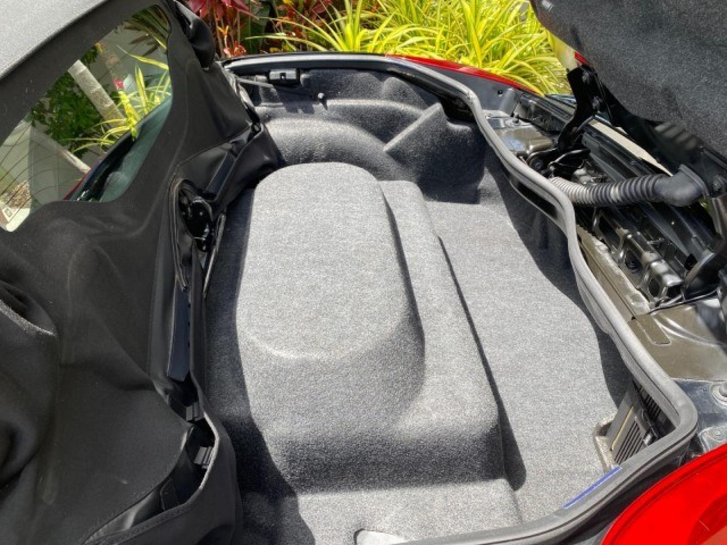 2008 Mysterious (Black) /Ebony Pontiac Solstice GXP 2.0 ECOTURBO LOW MILES 26,059 (1G2MG35X28Y) with an Turbo Ecotec 2.0L VVT DOHC 4-Cyl Aluminum Engine engine, Manual transmission, located at 4701 North Dixie Hwy, Pompano Beach, FL, 33064, (954) 422-2889, 26.240938, -80.123474 - OUR WEBPAGE FLORIDACARS1.COM HAS OVER 100 PHOTOS AND FREE CARFAX LINK 2008 Pontiac Solstice GXP Convertible 2.0L I4 F Gasoline 31 MPG Rear Wheel Drive Features ABS Brakes Air Conditioning Alloy Wheels AM/FM Stereo Auxiliary Audio Input CD Audio Convenience Package Cruise Control Leather Seats Manual- Photo#14