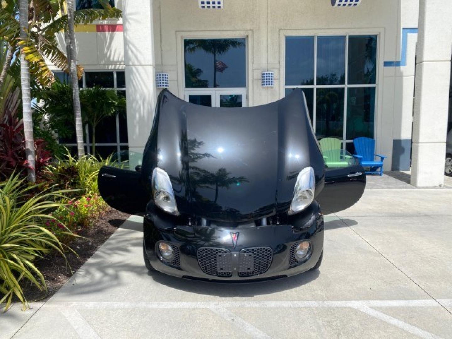 2008 Mysterious (Black) /Ebony Pontiac Solstice GXP 2.0 ECOTURBO LOW MILES 26,059 (1G2MG35X28Y) with an Turbo Ecotec 2.0L VVT DOHC 4-Cyl Aluminum Engine engine, Manual transmission, located at 4701 North Dixie Hwy, Pompano Beach, FL, 33064, (954) 422-2889, 26.240938, -80.123474 - OUR WEBPAGE FLORIDACARS1.COM HAS OVER 100 PHOTOS AND FREE CARFAX LINK 2008 Pontiac Solstice GXP Convertible 2.0L I4 F Gasoline 31 MPG Rear Wheel Drive Features ABS Brakes Air Conditioning Alloy Wheels AM/FM Stereo Auxiliary Audio Input CD Audio Convenience Package Cruise Control Leather Seats Manual- Photo#16
