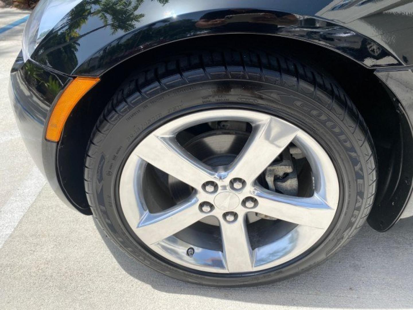 2008 Mysterious (Black) /Ebony Pontiac Solstice GXP 2.0 ECOTURBO LOW MILES 26,059 (1G2MG35X28Y) with an Turbo Ecotec 2.0L VVT DOHC 4-Cyl Aluminum Engine engine, Manual transmission, located at 4701 North Dixie Hwy, Pompano Beach, FL, 33064, (954) 422-2889, 26.240938, -80.123474 - OUR WEBPAGE FLORIDACARS1.COM HAS OVER 100 PHOTOS AND FREE CARFAX LINK 2008 Pontiac Solstice GXP Convertible 2.0L I4 F Gasoline 31 MPG Rear Wheel Drive Features ABS Brakes Air Conditioning Alloy Wheels AM/FM Stereo Auxiliary Audio Input CD Audio Convenience Package Cruise Control Leather Seats Manual- Photo#19