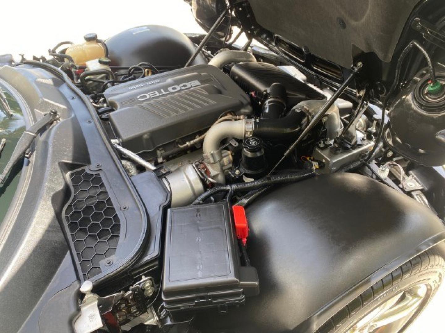 2008 Mysterious (Black) /Ebony Pontiac Solstice GXP 2.0 ECOTURBO LOW MILES 26,059 (1G2MG35X28Y) with an Turbo Ecotec 2.0L VVT DOHC 4-Cyl Aluminum Engine engine, Manual transmission, located at 4701 North Dixie Hwy, Pompano Beach, FL, 33064, (954) 422-2889, 26.240938, -80.123474 - OUR WEBPAGE FLORIDACARS1.COM HAS OVER 100 PHOTOS AND FREE CARFAX LINK 2008 Pontiac Solstice GXP Convertible 2.0L I4 F Gasoline 31 MPG Rear Wheel Drive Features ABS Brakes Air Conditioning Alloy Wheels AM/FM Stereo Auxiliary Audio Input CD Audio Convenience Package Cruise Control Leather Seats Manual- Photo#25