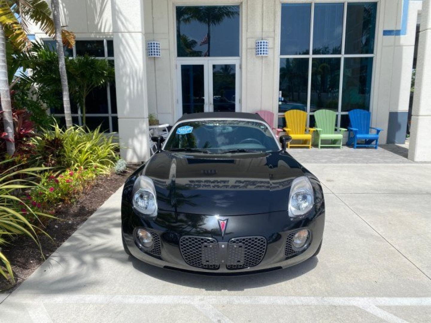2008 Mysterious (Black) /Ebony Pontiac Solstice GXP 2.0 ECOTURBO LOW MILES 26,059 (1G2MG35X28Y) with an Turbo Ecotec 2.0L VVT DOHC 4-Cyl Aluminum Engine engine, Manual transmission, located at 4701 North Dixie Hwy, Pompano Beach, FL, 33064, (954) 422-2889, 26.240938, -80.123474 - OUR WEBPAGE FLORIDACARS1.COM HAS OVER 100 PHOTOS AND FREE CARFAX LINK 2008 Pontiac Solstice GXP Convertible 2.0L I4 F Gasoline 31 MPG Rear Wheel Drive Features ABS Brakes Air Conditioning Alloy Wheels AM/FM Stereo Auxiliary Audio Input CD Audio Convenience Package Cruise Control Leather Seats Manual- Photo#26
