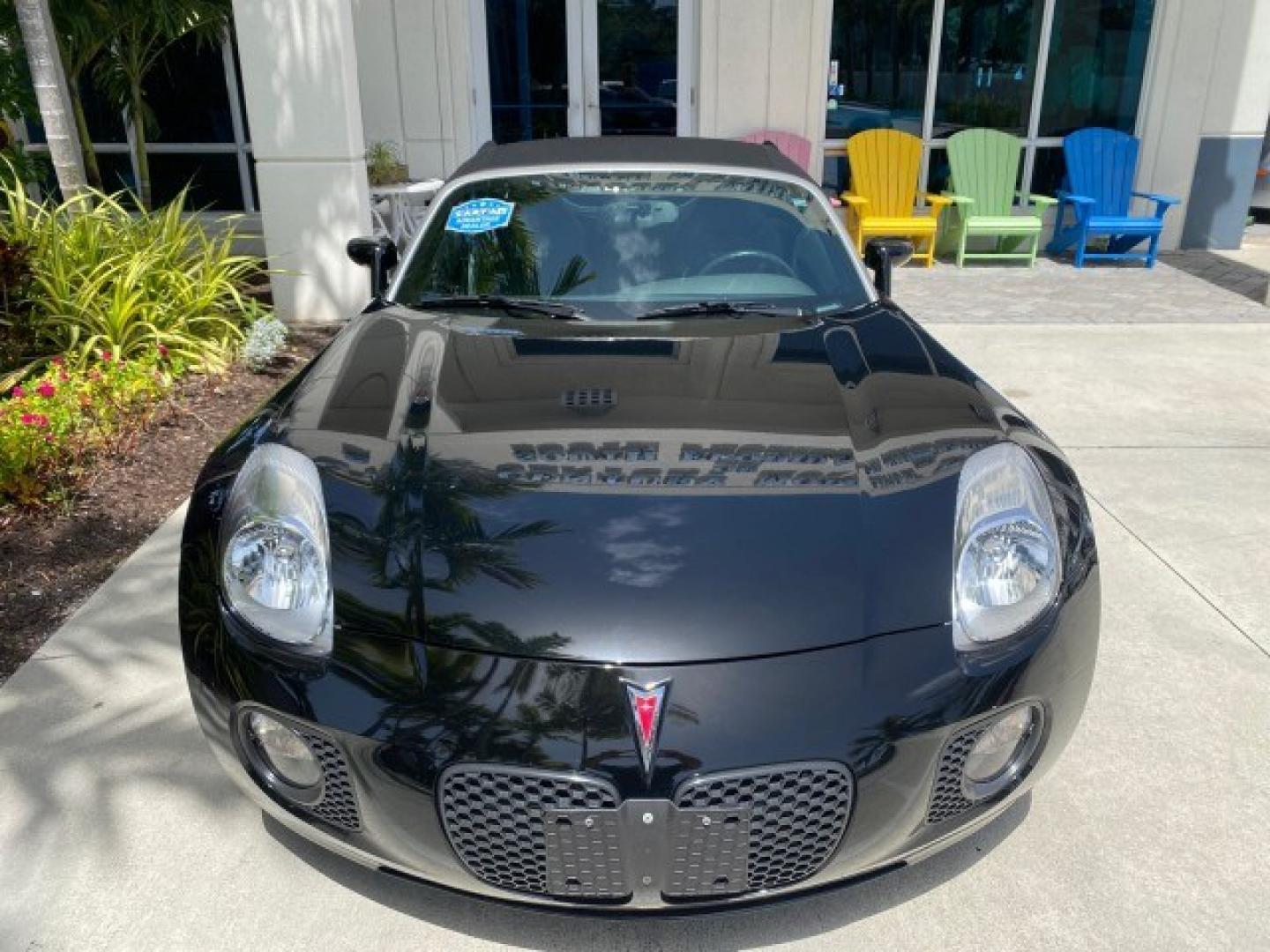 2008 Mysterious (Black) /Ebony Pontiac Solstice GXP 2.0 ECOTURBO LOW MILES 26,059 (1G2MG35X28Y) with an Turbo Ecotec 2.0L VVT DOHC 4-Cyl Aluminum Engine engine, Manual transmission, located at 4701 North Dixie Hwy, Pompano Beach, FL, 33064, (954) 422-2889, 26.240938, -80.123474 - OUR WEBPAGE FLORIDACARS1.COM HAS OVER 100 PHOTOS AND FREE CARFAX LINK 2008 Pontiac Solstice GXP Convertible 2.0L I4 F Gasoline 31 MPG Rear Wheel Drive Features ABS Brakes Air Conditioning Alloy Wheels AM/FM Stereo Auxiliary Audio Input CD Audio Convenience Package Cruise Control Leather Seats Manual- Photo#27