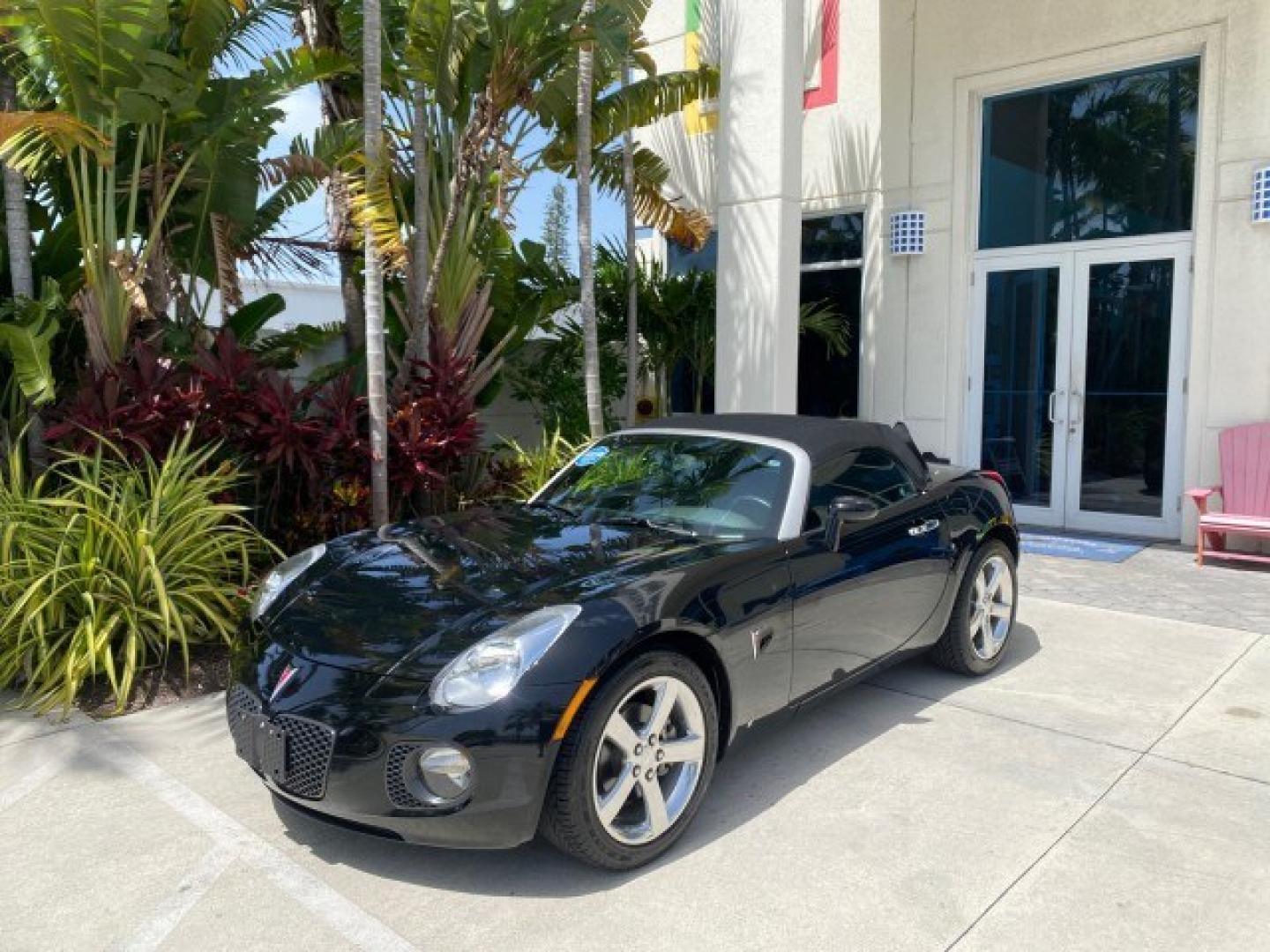 2008 Mysterious (Black) /Ebony Pontiac Solstice GXP 2.0 ECOTURBO LOW MILES 26,059 (1G2MG35X28Y) with an Turbo Ecotec 2.0L VVT DOHC 4-Cyl Aluminum Engine engine, Manual transmission, located at 4701 North Dixie Hwy, Pompano Beach, FL, 33064, (954) 422-2889, 26.240938, -80.123474 - OUR WEBPAGE FLORIDACARS1.COM HAS OVER 100 PHOTOS AND FREE CARFAX LINK 2008 Pontiac Solstice GXP Convertible 2.0L I4 F Gasoline 31 MPG Rear Wheel Drive Features ABS Brakes Air Conditioning Alloy Wheels AM/FM Stereo Auxiliary Audio Input CD Audio Convenience Package Cruise Control Leather Seats Manual- Photo#28