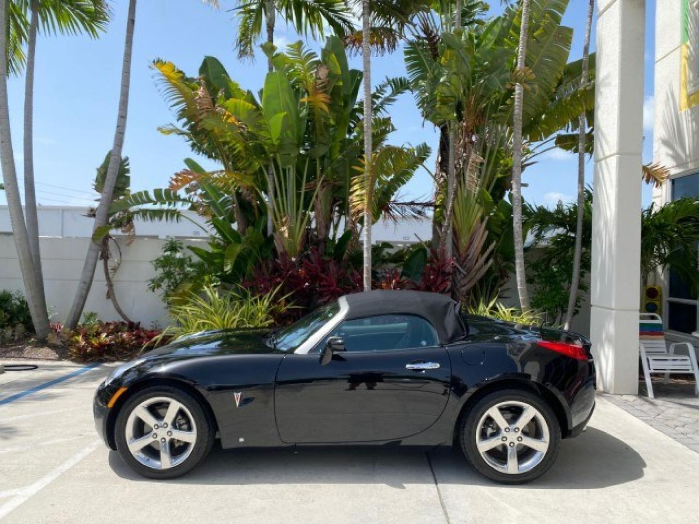2008 Mysterious (Black) /Ebony Pontiac Solstice GXP 2.0 ECOTURBO LOW MILES 26,059 (1G2MG35X28Y) with an Turbo Ecotec 2.0L VVT DOHC 4-Cyl Aluminum Engine engine, Manual transmission, located at 4701 North Dixie Hwy, Pompano Beach, FL, 33064, (954) 422-2889, 26.240938, -80.123474 - OUR WEBPAGE FLORIDACARS1.COM HAS OVER 100 PHOTOS AND FREE CARFAX LINK 2008 Pontiac Solstice GXP Convertible 2.0L I4 F Gasoline 31 MPG Rear Wheel Drive Features ABS Brakes Air Conditioning Alloy Wheels AM/FM Stereo Auxiliary Audio Input CD Audio Convenience Package Cruise Control Leather Seats Manual- Photo#30