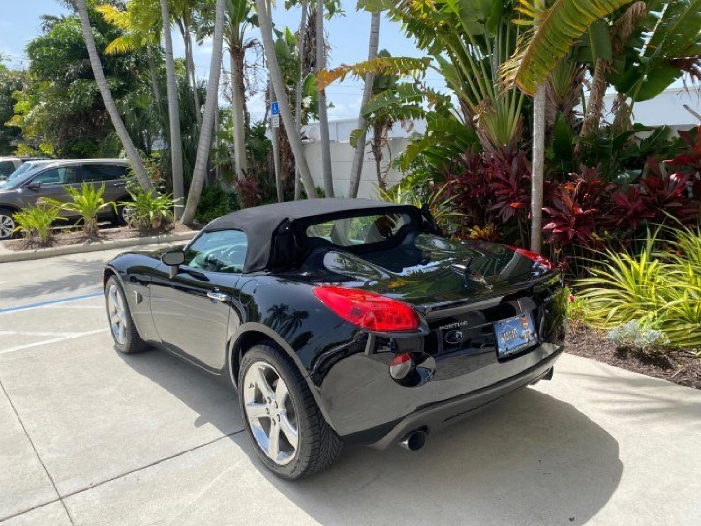 2008 Mysterious (Black) /Ebony Pontiac Solstice GXP 2.0 ECOTURBO LOW MILES 26,059 (1G2MG35X28Y) with an Turbo Ecotec 2.0L VVT DOHC 4-Cyl Aluminum Engine engine, Manual transmission, located at 4701 North Dixie Hwy, Pompano Beach, FL, 33064, (954) 422-2889, 26.240938, -80.123474 - OUR WEBPAGE FLORIDACARS1.COM HAS OVER 100 PHOTOS AND FREE CARFAX LINK 2008 Pontiac Solstice GXP Convertible 2.0L I4 F Gasoline 31 MPG Rear Wheel Drive Features ABS Brakes Air Conditioning Alloy Wheels AM/FM Stereo Auxiliary Audio Input CD Audio Convenience Package Cruise Control Leather Seats Manual- Photo#32