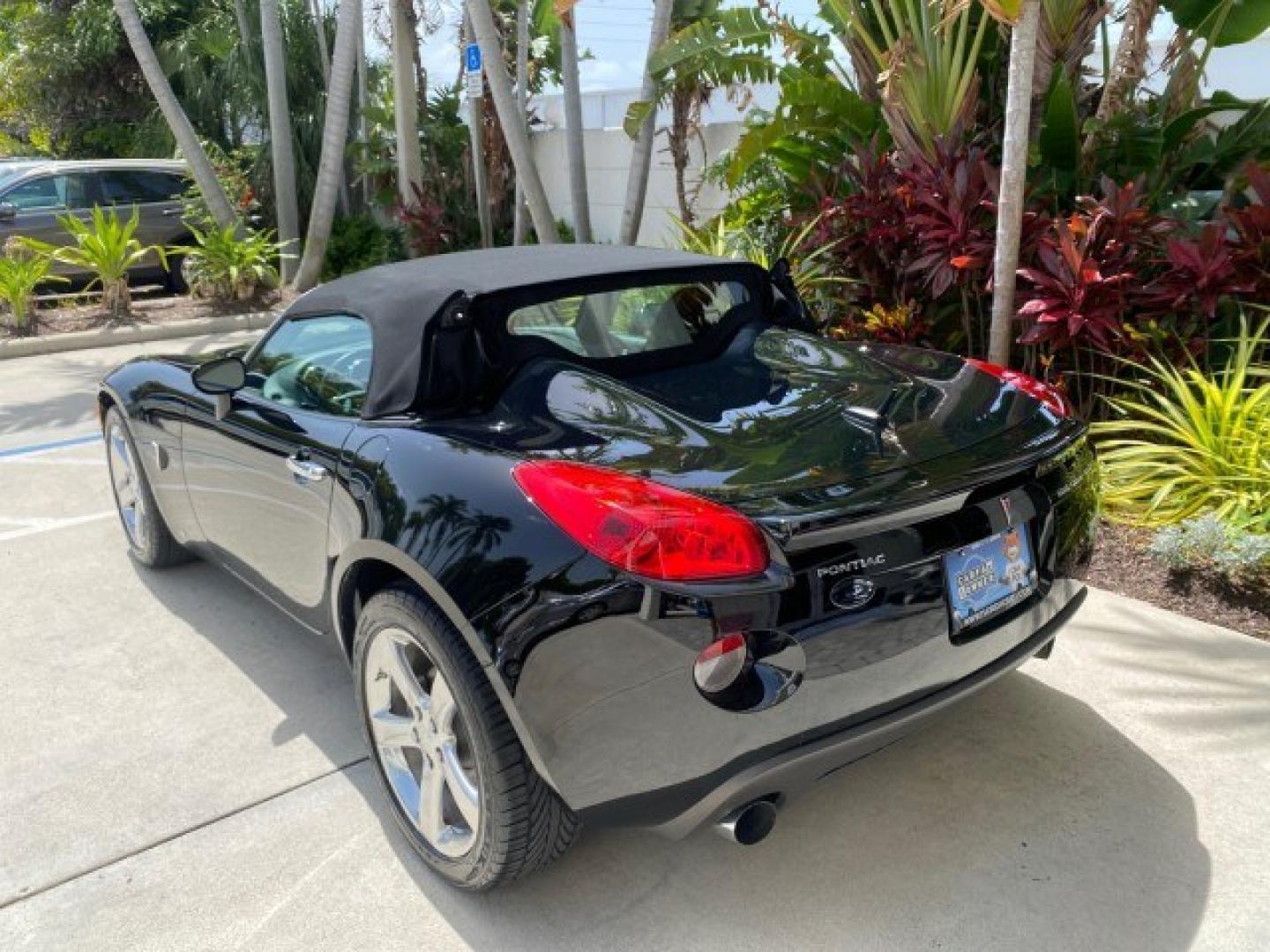 2008 Mysterious (Black) /Ebony Pontiac Solstice GXP 2.0 ECOTURBO LOW MILES 26,059 (1G2MG35X28Y) with an Turbo Ecotec 2.0L VVT DOHC 4-Cyl Aluminum Engine engine, Manual transmission, located at 4701 North Dixie Hwy, Pompano Beach, FL, 33064, (954) 422-2889, 26.240938, -80.123474 - OUR WEBPAGE FLORIDACARS1.COM HAS OVER 100 PHOTOS AND FREE CARFAX LINK 2008 Pontiac Solstice GXP Convertible 2.0L I4 F Gasoline 31 MPG Rear Wheel Drive Features ABS Brakes Air Conditioning Alloy Wheels AM/FM Stereo Auxiliary Audio Input CD Audio Convenience Package Cruise Control Leather Seats Manual- Photo#33