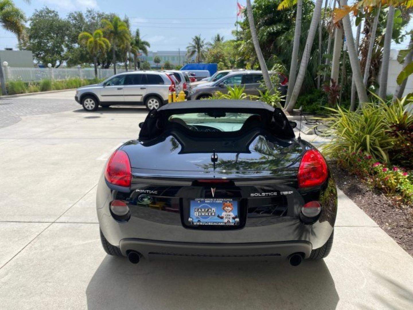 2008 Mysterious (Black) /Ebony Pontiac Solstice GXP 2.0 ECOTURBO LOW MILES 26,059 (1G2MG35X28Y) with an Turbo Ecotec 2.0L VVT DOHC 4-Cyl Aluminum Engine engine, Manual transmission, located at 4701 North Dixie Hwy, Pompano Beach, FL, 33064, (954) 422-2889, 26.240938, -80.123474 - OUR WEBPAGE FLORIDACARS1.COM HAS OVER 100 PHOTOS AND FREE CARFAX LINK 2008 Pontiac Solstice GXP Convertible 2.0L I4 F Gasoline 31 MPG Rear Wheel Drive Features ABS Brakes Air Conditioning Alloy Wheels AM/FM Stereo Auxiliary Audio Input CD Audio Convenience Package Cruise Control Leather Seats Manual- Photo#34