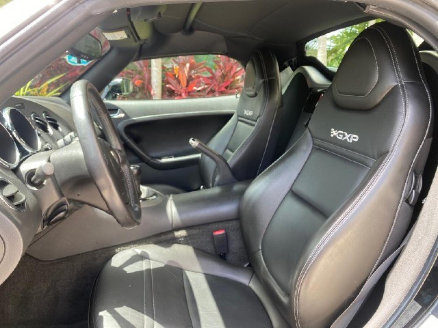 2008 Mysterious (Black) /Ebony Pontiac Solstice GXP 2.0 ECOTURBO LOW MILES 26,059 (1G2MG35X28Y) with an Turbo Ecotec 2.0L VVT DOHC 4-Cyl Aluminum Engine engine, Manual transmission, located at 4701 North Dixie Hwy, Pompano Beach, FL, 33064, (954) 422-2889, 26.240938, -80.123474 - OUR WEBPAGE FLORIDACARS1.COM HAS OVER 100 PHOTOS AND FREE CARFAX LINK 2008 Pontiac Solstice GXP Convertible 2.0L I4 F Gasoline 31 MPG Rear Wheel Drive Features ABS Brakes Air Conditioning Alloy Wheels AM/FM Stereo Auxiliary Audio Input CD Audio Convenience Package Cruise Control Leather Seats Manual- Photo#43