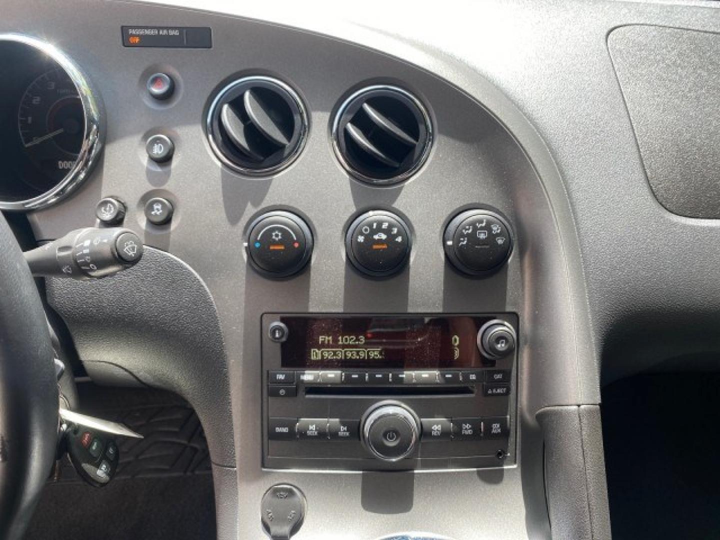 2008 Mysterious (Black) /Ebony Pontiac Solstice GXP 2.0 ECOTURBO LOW MILES 26,059 (1G2MG35X28Y) with an Turbo Ecotec 2.0L VVT DOHC 4-Cyl Aluminum Engine engine, Manual transmission, located at 4701 North Dixie Hwy, Pompano Beach, FL, 33064, (954) 422-2889, 26.240938, -80.123474 - OUR WEBPAGE FLORIDACARS1.COM HAS OVER 100 PHOTOS AND FREE CARFAX LINK 2008 Pontiac Solstice GXP Convertible 2.0L I4 F Gasoline 31 MPG Rear Wheel Drive Features ABS Brakes Air Conditioning Alloy Wheels AM/FM Stereo Auxiliary Audio Input CD Audio Convenience Package Cruise Control Leather Seats Manual- Photo#56