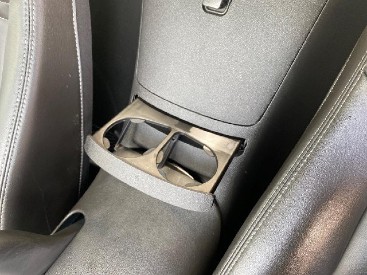 2008 Mysterious (Black) /Ebony Pontiac Solstice GXP 2.0 ECOTURBO LOW MILES 26,059 (1G2MG35X28Y) with an Turbo Ecotec 2.0L VVT DOHC 4-Cyl Aluminum Engine engine, Manual transmission, located at 4701 North Dixie Hwy, Pompano Beach, FL, 33064, (954) 422-2889, 26.240938, -80.123474 - OUR WEBPAGE FLORIDACARS1.COM HAS OVER 100 PHOTOS AND FREE CARFAX LINK 2008 Pontiac Solstice GXP Convertible 2.0L I4 F Gasoline 31 MPG Rear Wheel Drive Features ABS Brakes Air Conditioning Alloy Wheels AM/FM Stereo Auxiliary Audio Input CD Audio Convenience Package Cruise Control Leather Seats Manual- Photo#64