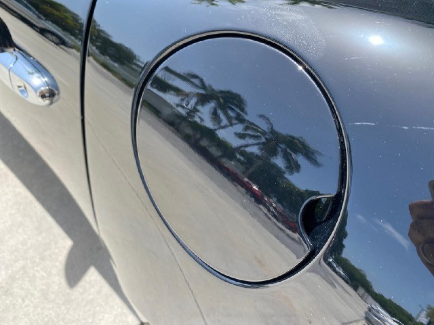 2008 Mysterious (Black) /Ebony Pontiac Solstice GXP 2.0 ECOTURBO LOW MILES 26,059 (1G2MG35X28Y) with an Turbo Ecotec 2.0L VVT DOHC 4-Cyl Aluminum Engine engine, Manual transmission, located at 4701 North Dixie Hwy, Pompano Beach, FL, 33064, (954) 422-2889, 26.240938, -80.123474 - OUR WEBPAGE FLORIDACARS1.COM HAS OVER 100 PHOTOS AND FREE CARFAX LINK 2008 Pontiac Solstice GXP Convertible 2.0L I4 F Gasoline 31 MPG Rear Wheel Drive Features ABS Brakes Air Conditioning Alloy Wheels AM/FM Stereo Auxiliary Audio Input CD Audio Convenience Package Cruise Control Leather Seats Manual- Photo#74