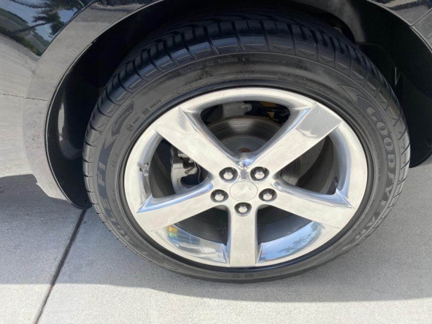 2008 Mysterious (Black) /Ebony Pontiac Solstice GXP 2.0 ECOTURBO LOW MILES 26,059 (1G2MG35X28Y) with an Turbo Ecotec 2.0L VVT DOHC 4-Cyl Aluminum Engine engine, Manual transmission, located at 4701 North Dixie Hwy, Pompano Beach, FL, 33064, (954) 422-2889, 26.240938, -80.123474 - OUR WEBPAGE FLORIDACARS1.COM HAS OVER 100 PHOTOS AND FREE CARFAX LINK 2008 Pontiac Solstice GXP Convertible 2.0L I4 F Gasoline 31 MPG Rear Wheel Drive Features ABS Brakes Air Conditioning Alloy Wheels AM/FM Stereo Auxiliary Audio Input CD Audio Convenience Package Cruise Control Leather Seats Manual- Photo#76