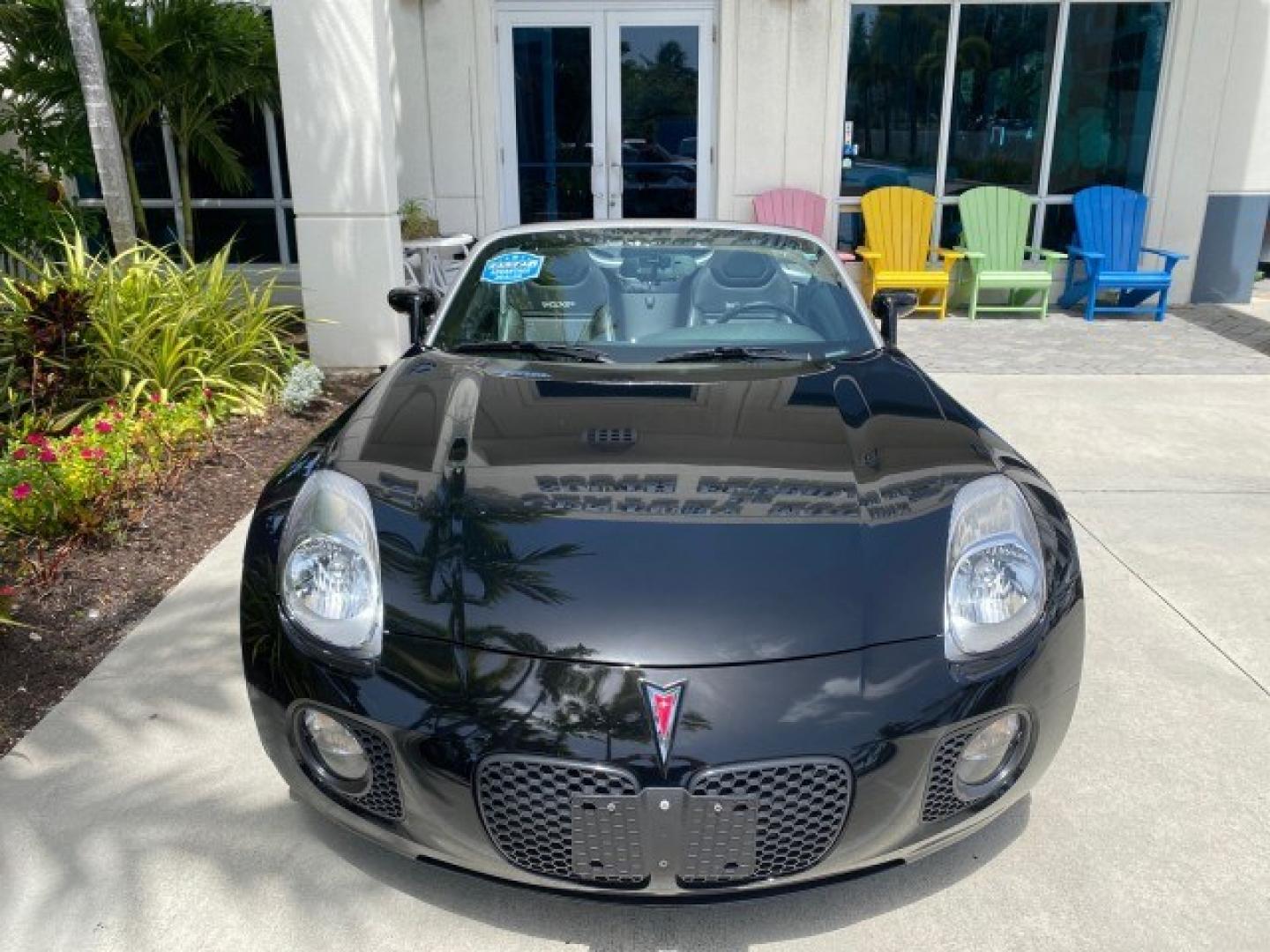 2008 Mysterious (Black) /Ebony Pontiac Solstice GXP 2.0 ECOTURBO LOW MILES 26,059 (1G2MG35X28Y) with an Turbo Ecotec 2.0L VVT DOHC 4-Cyl Aluminum Engine engine, Manual transmission, located at 4701 North Dixie Hwy, Pompano Beach, FL, 33064, (954) 422-2889, 26.240938, -80.123474 - OUR WEBPAGE FLORIDACARS1.COM HAS OVER 100 PHOTOS AND FREE CARFAX LINK 2008 Pontiac Solstice GXP Convertible 2.0L I4 F Gasoline 31 MPG Rear Wheel Drive Features ABS Brakes Air Conditioning Alloy Wheels AM/FM Stereo Auxiliary Audio Input CD Audio Convenience Package Cruise Control Leather Seats Manual- Photo#85