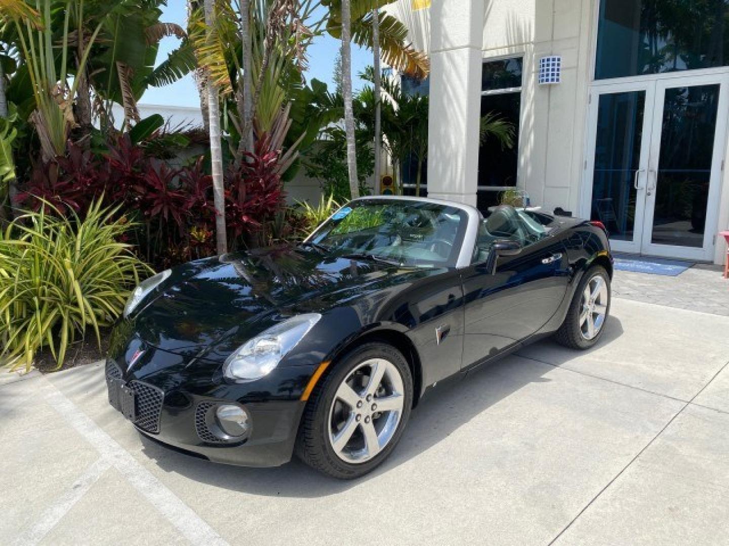 2008 Mysterious (Black) /Ebony Pontiac Solstice GXP 2.0 ECOTURBO LOW MILES 26,059 (1G2MG35X28Y) with an Turbo Ecotec 2.0L VVT DOHC 4-Cyl Aluminum Engine engine, Manual transmission, located at 4701 North Dixie Hwy, Pompano Beach, FL, 33064, (954) 422-2889, 26.240938, -80.123474 - OUR WEBPAGE FLORIDACARS1.COM HAS OVER 100 PHOTOS AND FREE CARFAX LINK 2008 Pontiac Solstice GXP Convertible 2.0L I4 F Gasoline 31 MPG Rear Wheel Drive Features ABS Brakes Air Conditioning Alloy Wheels AM/FM Stereo Auxiliary Audio Input CD Audio Convenience Package Cruise Control Leather Seats Manual- Photo#86