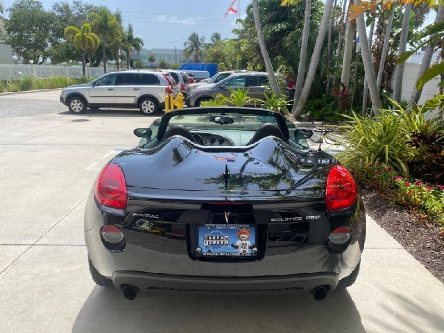 2008 Mysterious (Black) /Ebony Pontiac Solstice GXP 2.0 ECOTURBO LOW MILES 26,059 (1G2MG35X28Y) with an Turbo Ecotec 2.0L VVT DOHC 4-Cyl Aluminum Engine engine, Manual transmission, located at 4701 North Dixie Hwy, Pompano Beach, FL, 33064, (954) 422-2889, 26.240938, -80.123474 - OUR WEBPAGE FLORIDACARS1.COM HAS OVER 100 PHOTOS AND FREE CARFAX LINK 2008 Pontiac Solstice GXP Convertible 2.0L I4 F Gasoline 31 MPG Rear Wheel Drive Features ABS Brakes Air Conditioning Alloy Wheels AM/FM Stereo Auxiliary Audio Input CD Audio Convenience Package Cruise Control Leather Seats Manual- Photo#92