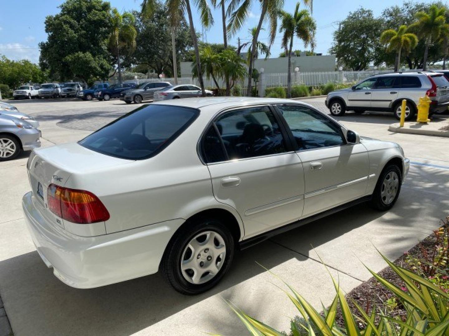 2000 Taffeta White /Gray Honda Civic EX LOW MILES 45,406 (1HGEJ8642YL) with an 1.6L SOHC VTEC 16-Valve I4 Engine engine, Automatic transmission, located at 4701 North Dixie Hwy, Pompano Beach, FL, 33064, (954) 422-2889, 26.240938, -80.123474 - OUR WEBPAGE FLORIDACARS1.COM HAS OVER 100 PHOTOS AND FREE CARFAX LINK 2000 Honda Civic EX Sedan 4 DR 1.6L I4 F 16V Gasoline 35 MPG Front Wheel Drive Features ABS Brakes Air Conditioning AM/FM Stereo Automatic Transmission CD Audio Cruise Control Power Locks Power Mirrors Power Windows Rear Defroster- Photo#7