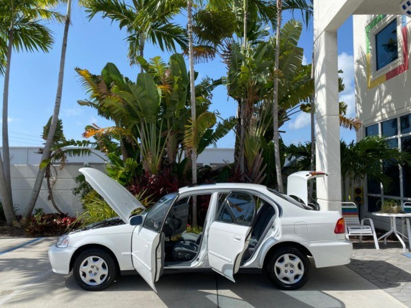 2000 Taffeta White /Gray Honda Civic EX LOW MILES 45,406 (1HGEJ8642YL) with an 1.6L SOHC VTEC 16-Valve I4 Engine engine, Automatic transmission, located at 4701 North Dixie Hwy, Pompano Beach, FL, 33064, (954) 422-2889, 26.240938, -80.123474 - OUR WEBPAGE FLORIDACARS1.COM HAS OVER 100 PHOTOS AND FREE CARFAX LINK 2000 Honda Civic EX Sedan 4 DR 1.6L I4 F 16V Gasoline 35 MPG Front Wheel Drive Features ABS Brakes Air Conditioning AM/FM Stereo Automatic Transmission CD Audio Cruise Control Power Locks Power Mirrors Power Windows Rear Defroster- Photo#8