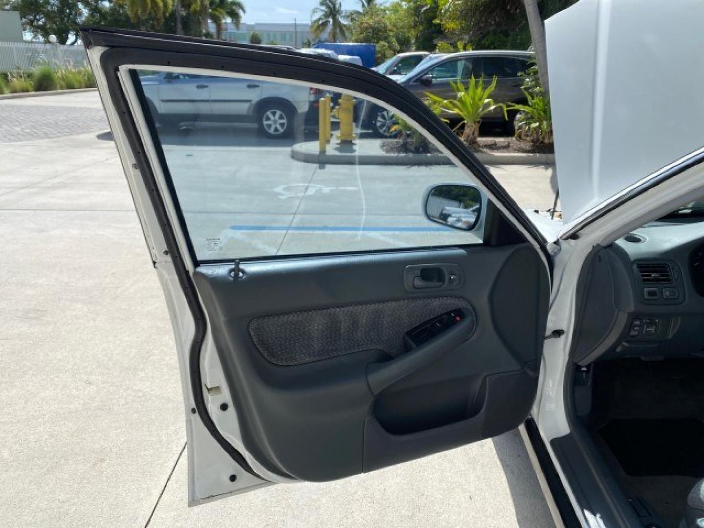 2000 Taffeta White /Gray Honda Civic EX LOW MILES 45,406 (1HGEJ8642YL) with an 1.6L SOHC VTEC 16-Valve I4 Engine engine, Automatic transmission, located at 4701 North Dixie Hwy, Pompano Beach, FL, 33064, (954) 422-2889, 26.240938, -80.123474 - OUR WEBPAGE FLORIDACARS1.COM HAS OVER 100 PHOTOS AND FREE CARFAX LINK 2000 Honda Civic EX Sedan 4 DR 1.6L I4 F 16V Gasoline 35 MPG Front Wheel Drive Features ABS Brakes Air Conditioning AM/FM Stereo Automatic Transmission CD Audio Cruise Control Power Locks Power Mirrors Power Windows Rear Defroster- Photo#9