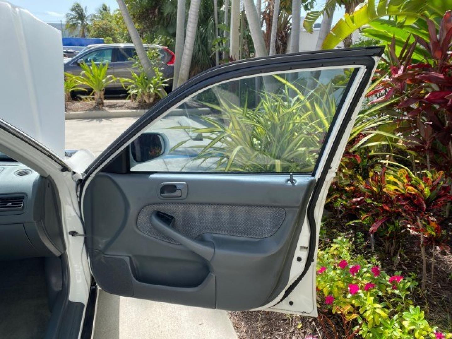 2000 Taffeta White /Gray Honda Civic EX LOW MILES 45,406 (1HGEJ8642YL) with an 1.6L SOHC VTEC 16-Valve I4 Engine engine, Automatic transmission, located at 4701 North Dixie Hwy, Pompano Beach, FL, 33064, (954) 422-2889, 26.240938, -80.123474 - OUR WEBPAGE FLORIDACARS1.COM HAS OVER 100 PHOTOS AND FREE CARFAX LINK 2000 Honda Civic EX Sedan 4 DR 1.6L I4 F 16V Gasoline 35 MPG Front Wheel Drive Features ABS Brakes Air Conditioning AM/FM Stereo Automatic Transmission CD Audio Cruise Control Power Locks Power Mirrors Power Windows Rear Defroster- Photo#11