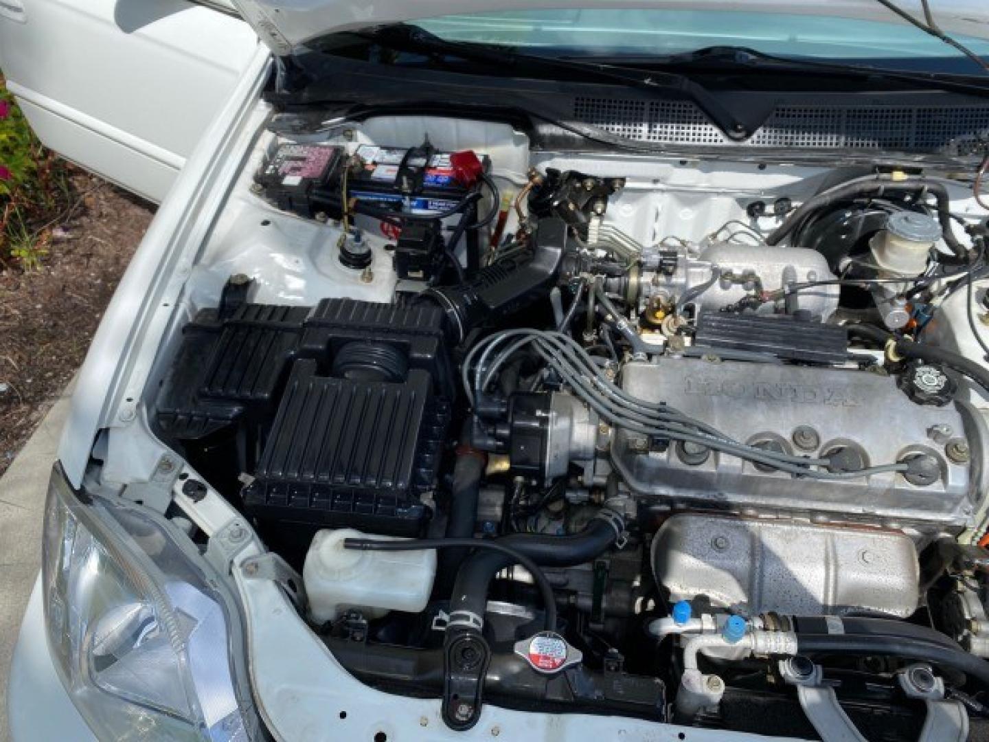 2000 Taffeta White /Gray Honda Civic EX LOW MILES 45,406 (1HGEJ8642YL) with an 1.6L SOHC VTEC 16-Valve I4 Engine engine, Automatic transmission, located at 4701 North Dixie Hwy, Pompano Beach, FL, 33064, (954) 422-2889, 26.240938, -80.123474 - OUR WEBPAGE FLORIDACARS1.COM HAS OVER 100 PHOTOS AND FREE CARFAX LINK 2000 Honda Civic EX Sedan 4 DR 1.6L I4 F 16V Gasoline 35 MPG Front Wheel Drive Features ABS Brakes Air Conditioning AM/FM Stereo Automatic Transmission CD Audio Cruise Control Power Locks Power Mirrors Power Windows Rear Defroster- Photo#24