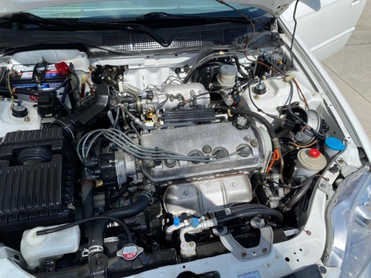 2000 Taffeta White /Gray Honda Civic EX LOW MILES 45,406 (1HGEJ8642YL) with an 1.6L SOHC VTEC 16-Valve I4 Engine engine, Automatic transmission, located at 4701 North Dixie Hwy, Pompano Beach, FL, 33064, (954) 422-2889, 26.240938, -80.123474 - OUR WEBPAGE FLORIDACARS1.COM HAS OVER 100 PHOTOS AND FREE CARFAX LINK 2000 Honda Civic EX Sedan 4 DR 1.6L I4 F 16V Gasoline 35 MPG Front Wheel Drive Features ABS Brakes Air Conditioning AM/FM Stereo Automatic Transmission CD Audio Cruise Control Power Locks Power Mirrors Power Windows Rear Defroster- Photo#25