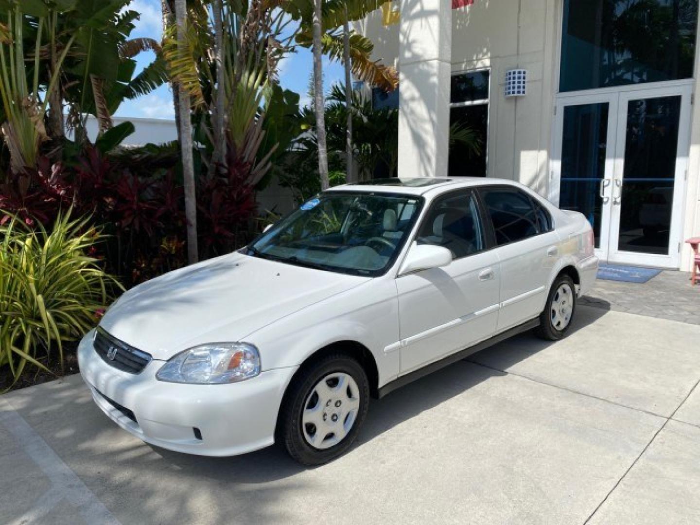 2000 Taffeta White /Gray Honda Civic EX LOW MILES 45,406 (1HGEJ8642YL) with an 1.6L SOHC VTEC 16-Valve I4 Engine engine, Automatic transmission, located at 4701 North Dixie Hwy, Pompano Beach, FL, 33064, (954) 422-2889, 26.240938, -80.123474 - OUR WEBPAGE FLORIDACARS1.COM HAS OVER 100 PHOTOS AND FREE CARFAX LINK 2000 Honda Civic EX Sedan 4 DR 1.6L I4 F 16V Gasoline 35 MPG Front Wheel Drive Features ABS Brakes Air Conditioning AM/FM Stereo Automatic Transmission CD Audio Cruise Control Power Locks Power Mirrors Power Windows Rear Defroster- Photo#28