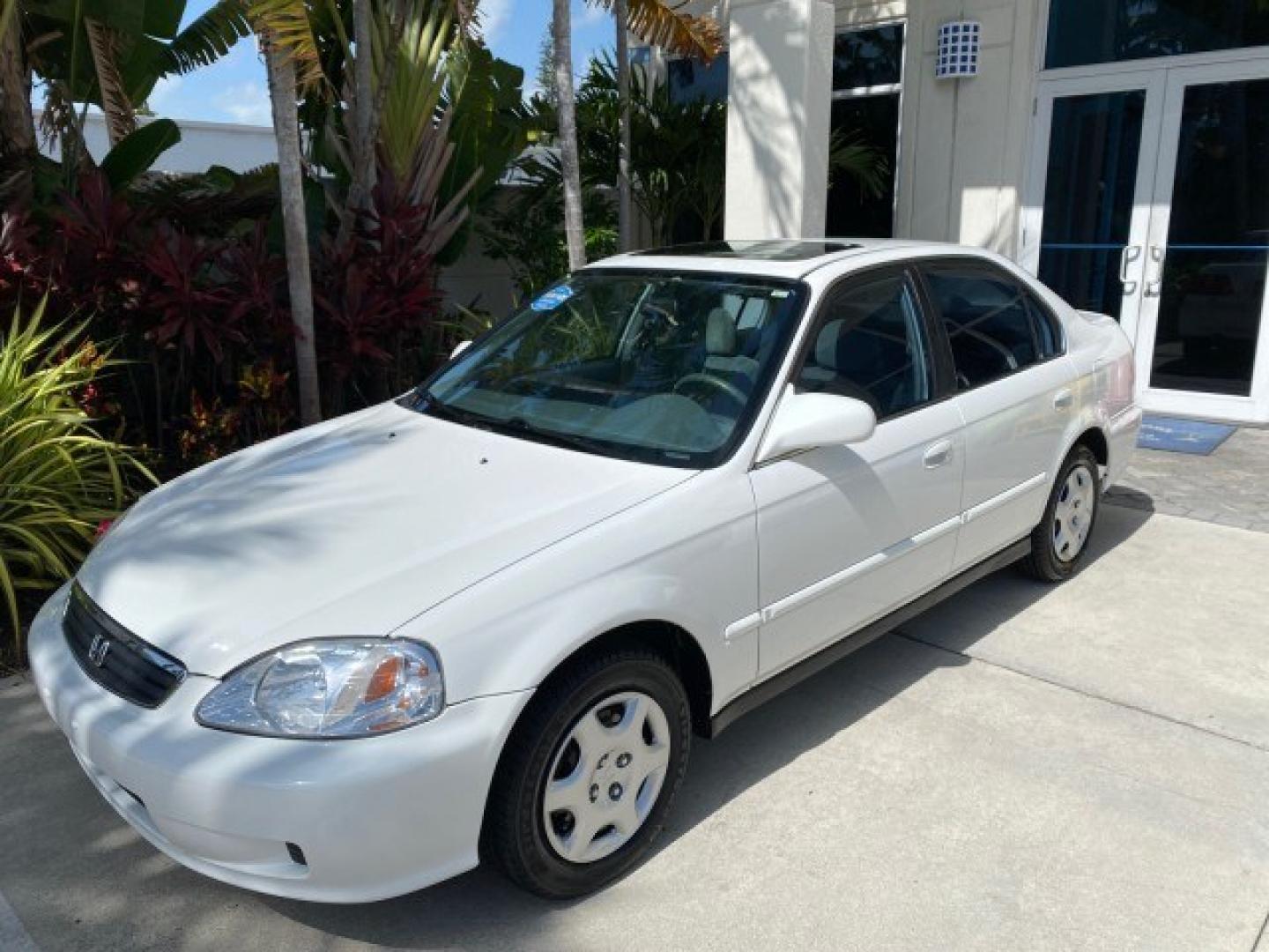 2000 Taffeta White /Gray Honda Civic EX LOW MILES 45,406 (1HGEJ8642YL) with an 1.6L SOHC VTEC 16-Valve I4 Engine engine, Automatic transmission, located at 4701 North Dixie Hwy, Pompano Beach, FL, 33064, (954) 422-2889, 26.240938, -80.123474 - OUR WEBPAGE FLORIDACARS1.COM HAS OVER 100 PHOTOS AND FREE CARFAX LINK 2000 Honda Civic EX Sedan 4 DR 1.6L I4 F 16V Gasoline 35 MPG Front Wheel Drive Features ABS Brakes Air Conditioning AM/FM Stereo Automatic Transmission CD Audio Cruise Control Power Locks Power Mirrors Power Windows Rear Defroster- Photo#29