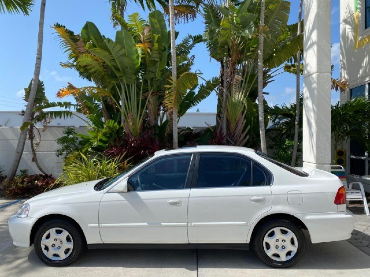 2000 Taffeta White /Gray Honda Civic EX LOW MILES 45,406 (1HGEJ8642YL) with an 1.6L SOHC VTEC 16-Valve I4 Engine engine, Automatic transmission, located at 4701 North Dixie Hwy, Pompano Beach, FL, 33064, (954) 422-2889, 26.240938, -80.123474 - OUR WEBPAGE FLORIDACARS1.COM HAS OVER 100 PHOTOS AND FREE CARFAX LINK 2000 Honda Civic EX Sedan 4 DR 1.6L I4 F 16V Gasoline 35 MPG Front Wheel Drive Features ABS Brakes Air Conditioning AM/FM Stereo Automatic Transmission CD Audio Cruise Control Power Locks Power Mirrors Power Windows Rear Defroster- Photo#31