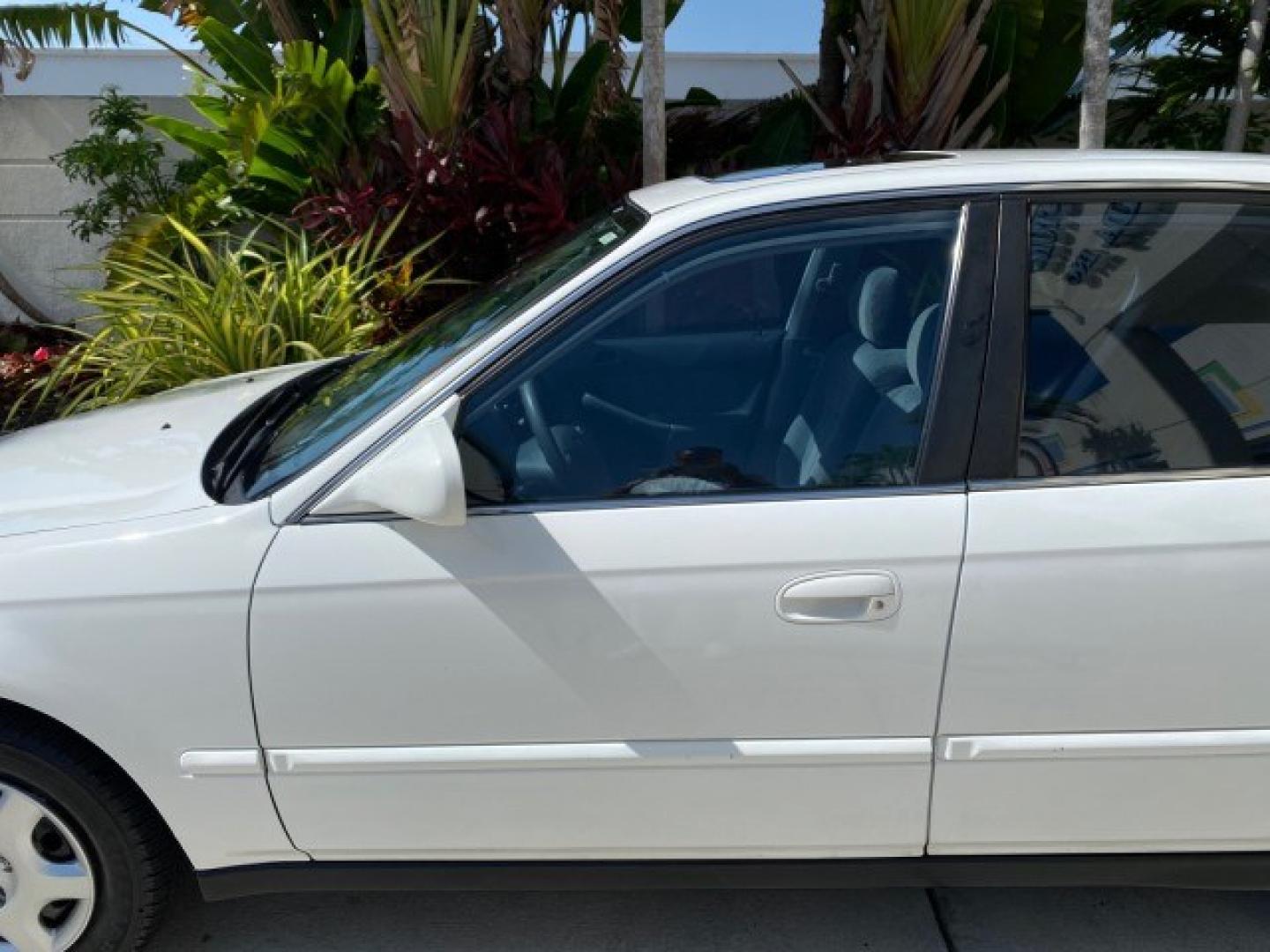 2000 Taffeta White /Gray Honda Civic EX LOW MILES 45,406 (1HGEJ8642YL) with an 1.6L SOHC VTEC 16-Valve I4 Engine engine, Automatic transmission, located at 4701 North Dixie Hwy, Pompano Beach, FL, 33064, (954) 422-2889, 26.240938, -80.123474 - OUR WEBPAGE FLORIDACARS1.COM HAS OVER 100 PHOTOS AND FREE CARFAX LINK 2000 Honda Civic EX Sedan 4 DR 1.6L I4 F 16V Gasoline 35 MPG Front Wheel Drive Features ABS Brakes Air Conditioning AM/FM Stereo Automatic Transmission CD Audio Cruise Control Power Locks Power Mirrors Power Windows Rear Defroster- Photo#36