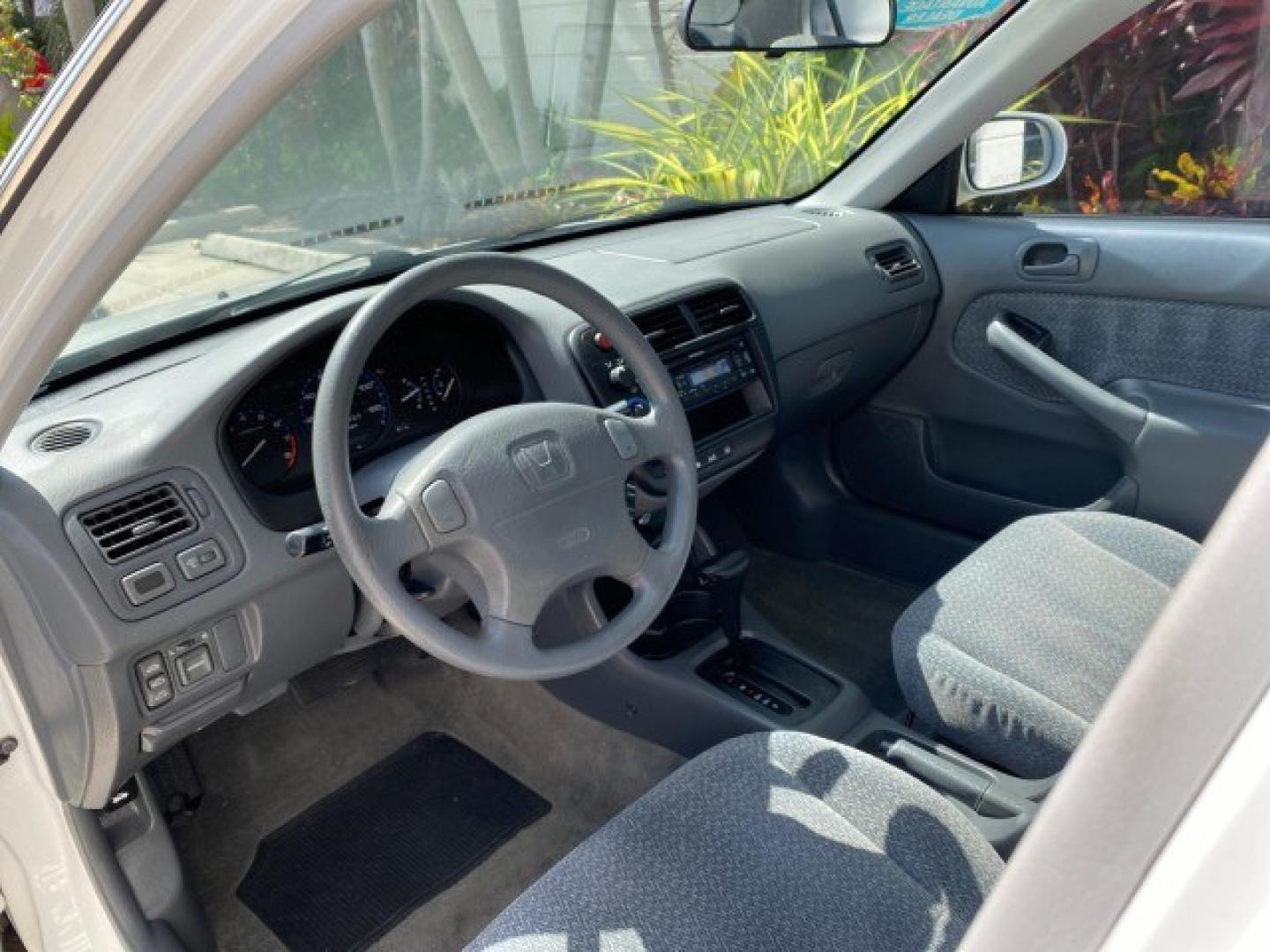 2000 Taffeta White /Gray Honda Civic EX LOW MILES 45,406 (1HGEJ8642YL) with an 1.6L SOHC VTEC 16-Valve I4 Engine engine, Automatic transmission, located at 4701 North Dixie Hwy, Pompano Beach, FL, 33064, (954) 422-2889, 26.240938, -80.123474 - OUR WEBPAGE FLORIDACARS1.COM HAS OVER 100 PHOTOS AND FREE CARFAX LINK 2000 Honda Civic EX Sedan 4 DR 1.6L I4 F 16V Gasoline 35 MPG Front Wheel Drive Features ABS Brakes Air Conditioning AM/FM Stereo Automatic Transmission CD Audio Cruise Control Power Locks Power Mirrors Power Windows Rear Defroster- Photo#45
