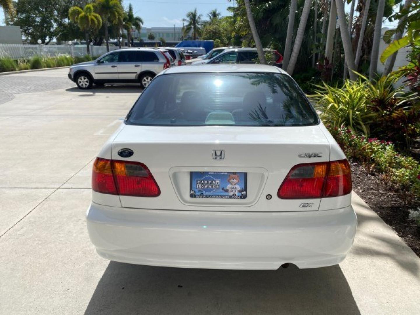 2000 Taffeta White /Gray Honda Civic EX LOW MILES 45,406 (1HGEJ8642YL) with an 1.6L SOHC VTEC 16-Valve I4 Engine engine, Automatic transmission, located at 4701 North Dixie Hwy, Pompano Beach, FL, 33064, (954) 422-2889, 26.240938, -80.123474 - OUR WEBPAGE FLORIDACARS1.COM HAS OVER 100 PHOTOS AND FREE CARFAX LINK 2000 Honda Civic EX Sedan 4 DR 1.6L I4 F 16V Gasoline 35 MPG Front Wheel Drive Features ABS Brakes Air Conditioning AM/FM Stereo Automatic Transmission CD Audio Cruise Control Power Locks Power Mirrors Power Windows Rear Defroster- Photo#91
