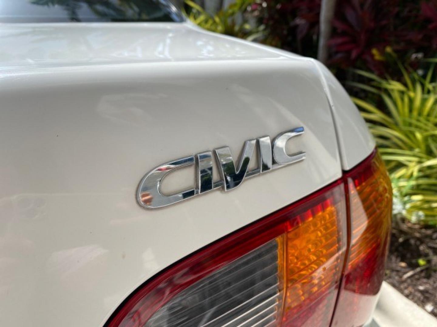 2000 Taffeta White /Gray Honda Civic EX LOW MILES 45,406 (1HGEJ8642YL) with an 1.6L SOHC VTEC 16-Valve I4 Engine engine, Automatic transmission, located at 4701 North Dixie Hwy, Pompano Beach, FL, 33064, (954) 422-2889, 26.240938, -80.123474 - OUR WEBPAGE FLORIDACARS1.COM HAS OVER 100 PHOTOS AND FREE CARFAX LINK 2000 Honda Civic EX Sedan 4 DR 1.6L I4 F 16V Gasoline 35 MPG Front Wheel Drive Features ABS Brakes Air Conditioning AM/FM Stereo Automatic Transmission CD Audio Cruise Control Power Locks Power Mirrors Power Windows Rear Defroster- Photo#93