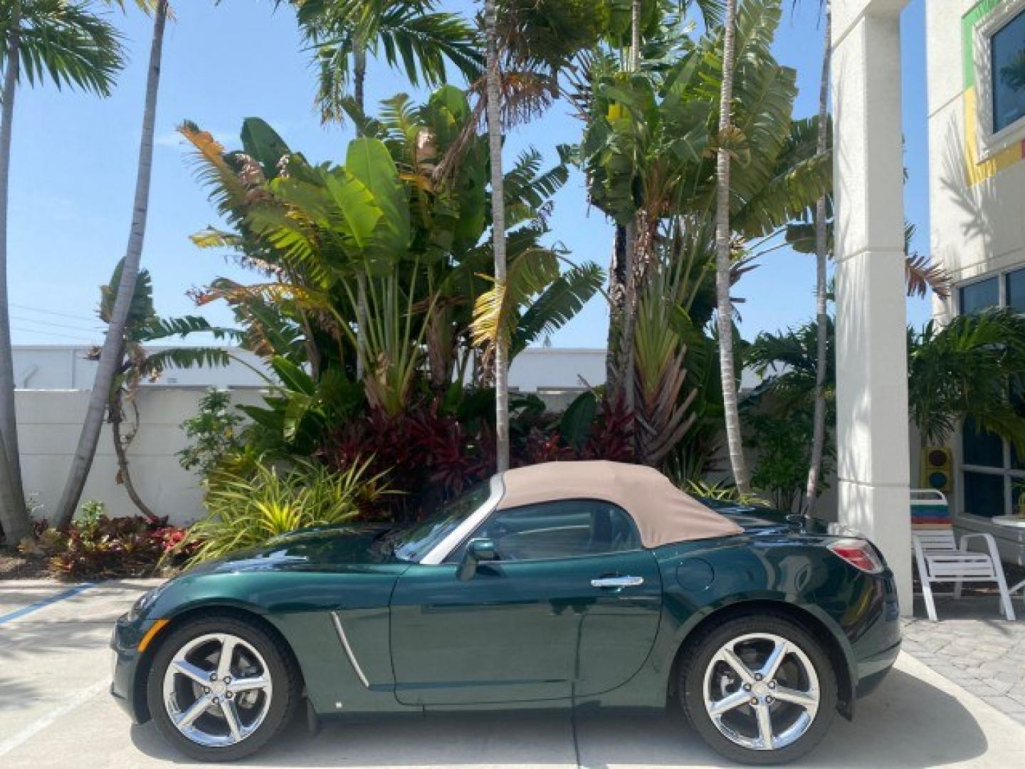 2008 Forest Green /Tan Saturn Sky AUTO TURBO Red Line LOW MILES 3,949 (1G8MG35X48Y) with an Turbocharged And Intercooled Ecotec 2.0L VVT DOHC 4-Cyl Aluminum Engine engine, Automatic transmission, located at 4701 North Dixie Hwy, Pompano Beach, FL, 33064, (954) 422-2889, 26.240938, -80.123474 - OUR WEBPAGE FLORIDACARS1.COM HAS OVER 100 PHOTOS AND FREE CARFAX LINK 2008 Saturn SKY Red Line Turbo All Original Paint Collectors Welcome Convertible 2.0L I4 F DOHC Gasoline 31 MPG Rear Wheel Drive Features ABS Brakes Air Conditioning Alloy Wheels AM/FM Stereo Automatic Transmission CD Audio Cruise- Photo#4