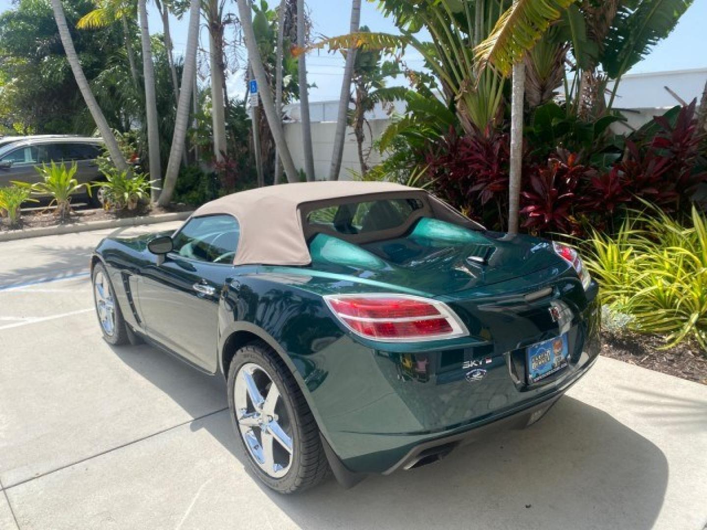 2008 Forest Green /Tan Saturn Sky AUTO TURBO Red Line LOW MILES 3,949 (1G8MG35X48Y) with an Turbocharged And Intercooled Ecotec 2.0L VVT DOHC 4-Cyl Aluminum Engine engine, Automatic transmission, located at 4701 North Dixie Hwy, Pompano Beach, FL, 33064, (954) 422-2889, 26.240938, -80.123474 - OUR WEBPAGE FLORIDACARS1.COM HAS OVER 100 PHOTOS AND FREE CARFAX LINK 2008 Saturn SKY Red Line Turbo All Original Paint Collectors Welcome Convertible 2.0L I4 F DOHC Gasoline 31 MPG Rear Wheel Drive Features ABS Brakes Air Conditioning Alloy Wheels AM/FM Stereo Automatic Transmission CD Audio Cruise- Photo#5