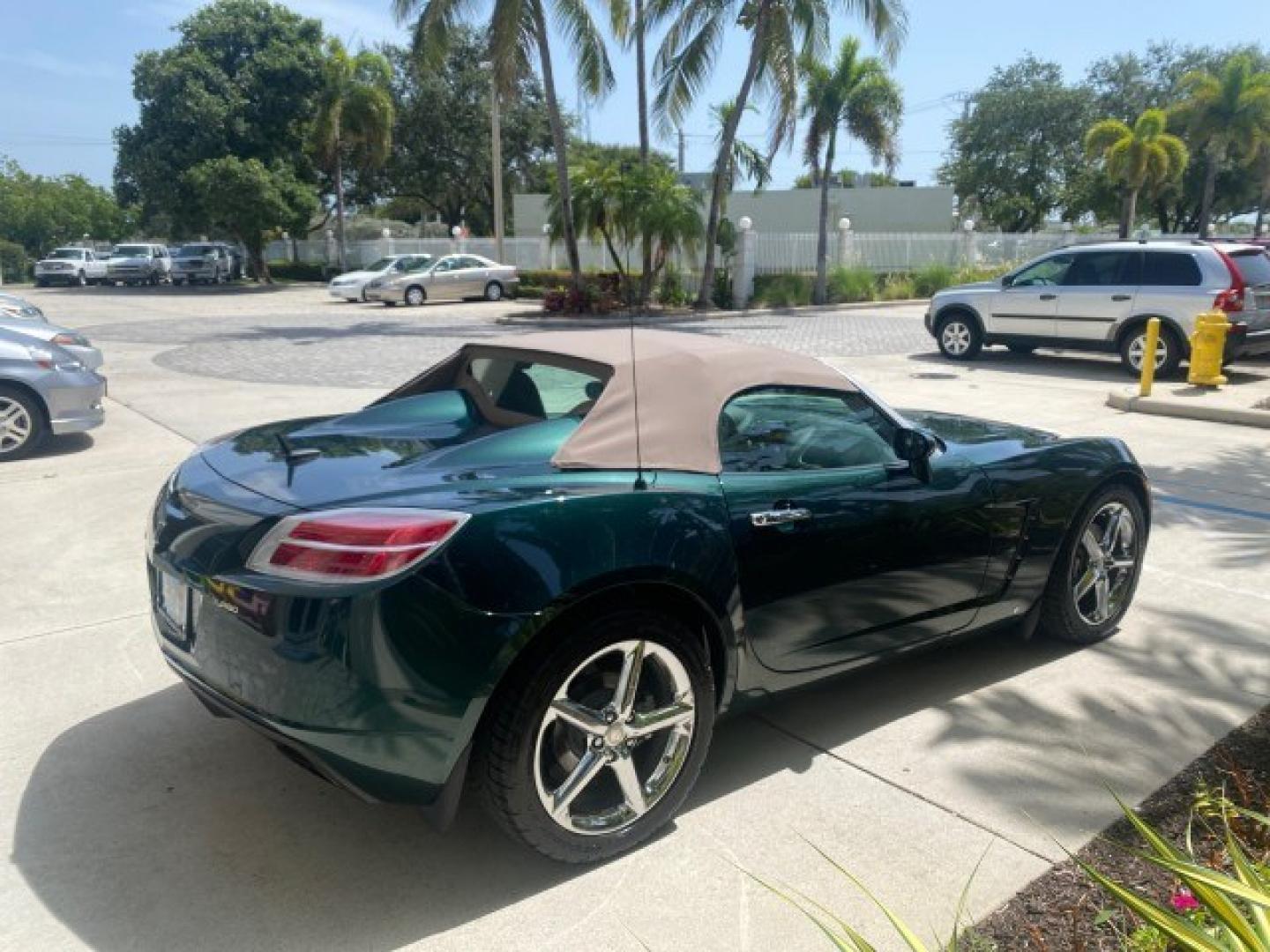 2008 Forest Green /Tan Saturn Sky AUTO TURBO Red Line LOW MILES 3,949 (1G8MG35X48Y) with an Turbocharged And Intercooled Ecotec 2.0L VVT DOHC 4-Cyl Aluminum Engine engine, Automatic transmission, located at 4701 North Dixie Hwy, Pompano Beach, FL, 33064, (954) 422-2889, 26.240938, -80.123474 - OUR WEBPAGE FLORIDACARS1.COM HAS OVER 100 PHOTOS AND FREE CARFAX LINK 2008 Saturn SKY Red Line Turbo All Original Paint Collectors Welcome Convertible 2.0L I4 F DOHC Gasoline 31 MPG Rear Wheel Drive Features ABS Brakes Air Conditioning Alloy Wheels AM/FM Stereo Automatic Transmission CD Audio Cruise- Photo#7