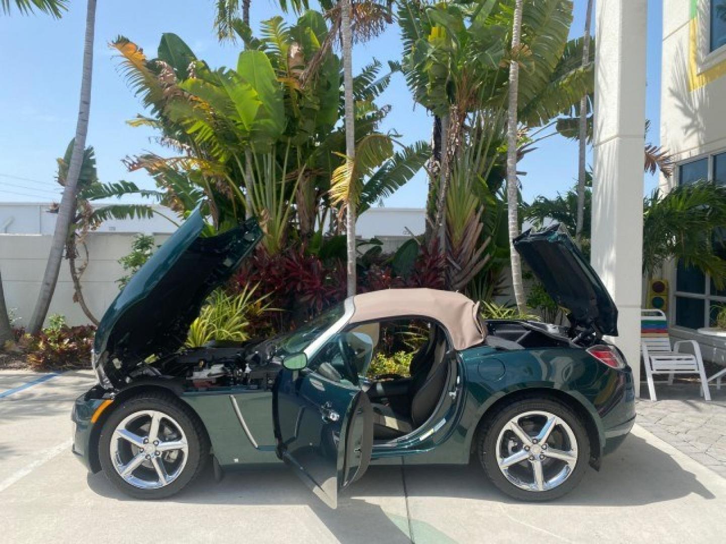 2008 Forest Green /Tan Saturn Sky AUTO TURBO Red Line LOW MILES 3,949 (1G8MG35X48Y) with an Turbocharged And Intercooled Ecotec 2.0L VVT DOHC 4-Cyl Aluminum Engine engine, Automatic transmission, located at 4701 North Dixie Hwy, Pompano Beach, FL, 33064, (954) 422-2889, 26.240938, -80.123474 - OUR WEBPAGE FLORIDACARS1.COM HAS OVER 100 PHOTOS AND FREE CARFAX LINK 2008 Saturn SKY Red Line Turbo All Original Paint Collectors Welcome Convertible 2.0L I4 F DOHC Gasoline 31 MPG Rear Wheel Drive Features ABS Brakes Air Conditioning Alloy Wheels AM/FM Stereo Automatic Transmission CD Audio Cruise- Photo#8