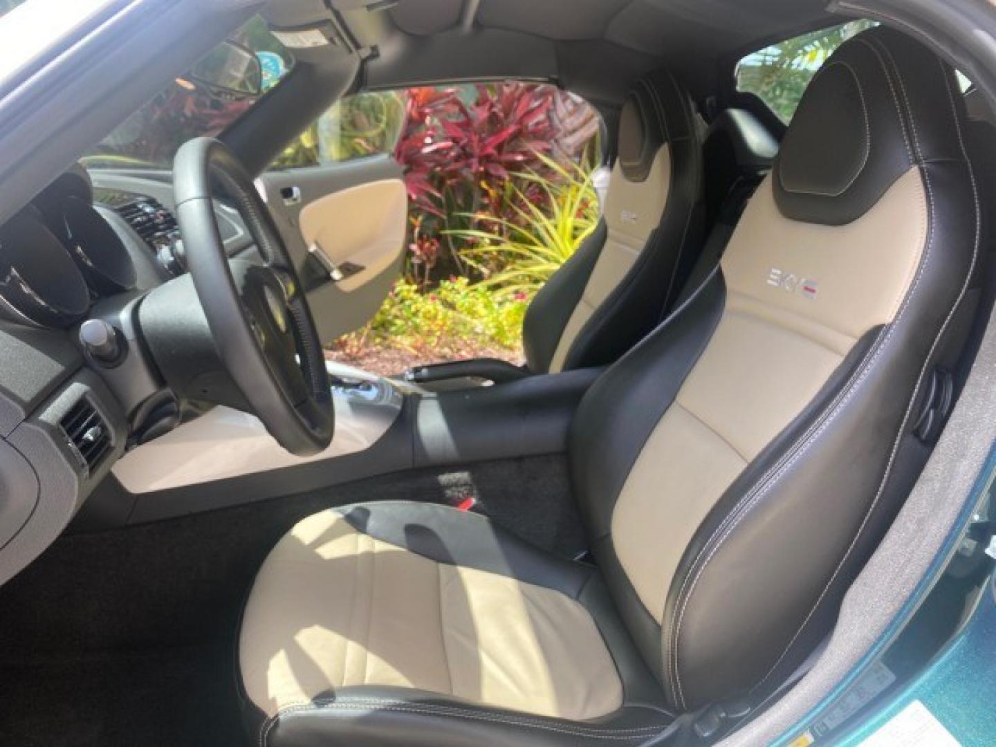 2008 Forest Green /Tan Saturn Sky AUTO TURBO Red Line LOW MILES 3,949 (1G8MG35X48Y) with an Turbocharged And Intercooled Ecotec 2.0L VVT DOHC 4-Cyl Aluminum Engine engine, Automatic transmission, located at 4701 North Dixie Hwy, Pompano Beach, FL, 33064, (954) 422-2889, 26.240938, -80.123474 - OUR WEBPAGE FLORIDACARS1.COM HAS OVER 100 PHOTOS AND FREE CARFAX LINK 2008 Saturn SKY Red Line Turbo All Original Paint Collectors Welcome Convertible 2.0L I4 F DOHC Gasoline 31 MPG Rear Wheel Drive Features ABS Brakes Air Conditioning Alloy Wheels AM/FM Stereo Automatic Transmission CD Audio Cruise- Photo#10