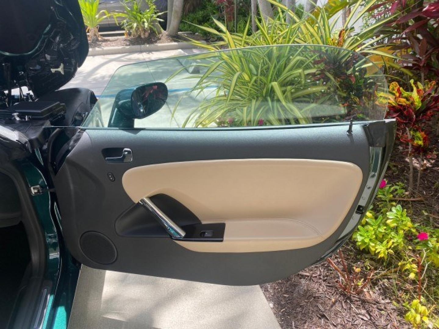 2008 Forest Green /Tan Saturn Sky AUTO TURBO Red Line LOW MILES 3,949 (1G8MG35X48Y) with an Turbocharged And Intercooled Ecotec 2.0L VVT DOHC 4-Cyl Aluminum Engine engine, Automatic transmission, located at 4701 North Dixie Hwy, Pompano Beach, FL, 33064, (954) 422-2889, 26.240938, -80.123474 - OUR WEBPAGE FLORIDACARS1.COM HAS OVER 100 PHOTOS AND FREE CARFAX LINK 2008 Saturn SKY Red Line Turbo All Original Paint Collectors Welcome Convertible 2.0L I4 F DOHC Gasoline 31 MPG Rear Wheel Drive Features ABS Brakes Air Conditioning Alloy Wheels AM/FM Stereo Automatic Transmission CD Audio Cruise- Photo#11