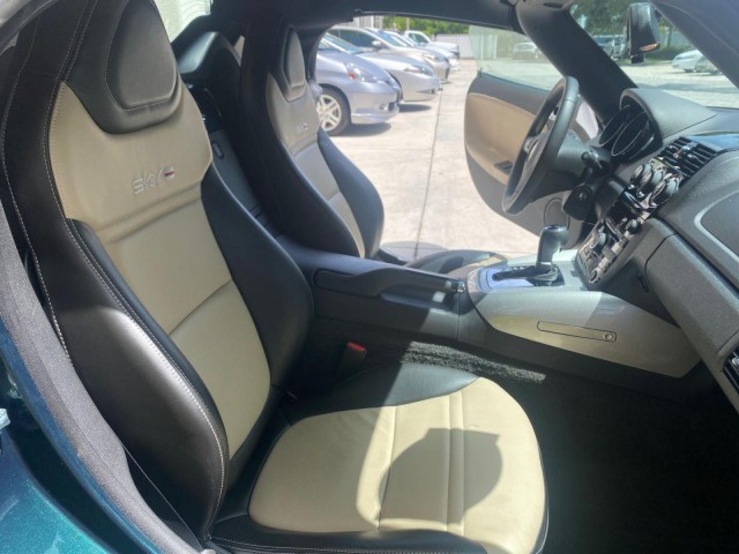 2008 Forest Green /Tan Saturn Sky AUTO TURBO Red Line LOW MILES 3,949 (1G8MG35X48Y) with an Turbocharged And Intercooled Ecotec 2.0L VVT DOHC 4-Cyl Aluminum Engine engine, Automatic transmission, located at 4701 North Dixie Hwy, Pompano Beach, FL, 33064, (954) 422-2889, 26.240938, -80.123474 - OUR WEBPAGE FLORIDACARS1.COM HAS OVER 100 PHOTOS AND FREE CARFAX LINK 2008 Saturn SKY Red Line Turbo All Original Paint Collectors Welcome Convertible 2.0L I4 F DOHC Gasoline 31 MPG Rear Wheel Drive Features ABS Brakes Air Conditioning Alloy Wheels AM/FM Stereo Automatic Transmission CD Audio Cruise- Photo#12